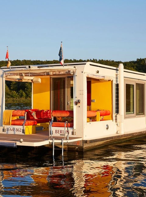 This House Boat Has Been Converted Into A Solar-Powered Tiny Home!