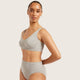 A woman modeling a light heather gray two-piece underwear set consisting of a scoop-neck bralette and high-waisted briefs, with the brand name 'BOODY' printed on the waistband of the briefs.