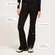 Black high-rise flare pants shown on a model from the waist down, with text callouts highlighting features.