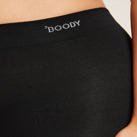 Close-up view of black smoothing short - bamboo viscose, elastane & nylon fabric. Boody logo on waistband.