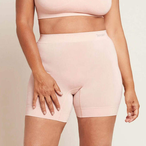 Person wearing nude Boody Smoothing Short with matching crop bra.