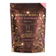 A stand-up pouch of Booja-Booja Organic Hot Chocolate on a plain white background. The packaging is dark brown with gold and pink decorative text and swirls, and a small pink corner tab is visible at the top right.