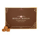 A box of Booja-Booja 'The Grand Selection' organic and dairy-free chocolate truffles, shown with three individual truffles in the foreground on a white background.