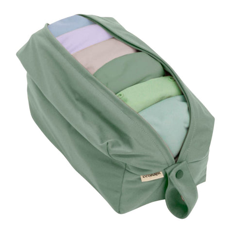 EcoNaps Pod Wet Bag with cloth nappies stored inside. Zip closure and snap loop handle. Olive colour.