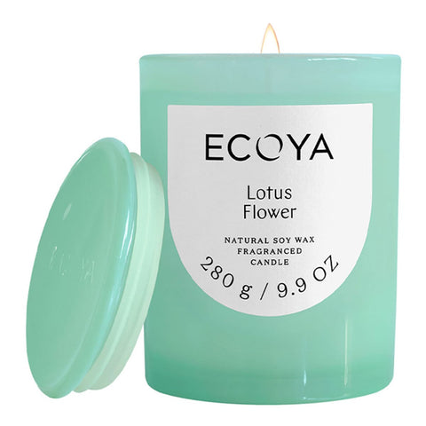 Light blue ECOYA candle with 'Lotus Flower' label on a white background.