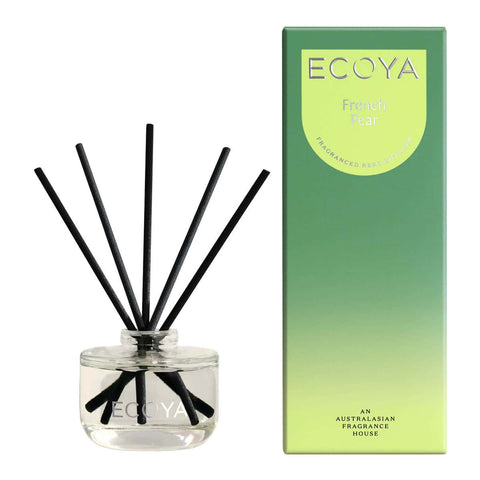 Ecoya French Pear diffuser with black sticks and green packaging on a white background