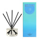 Ecoya diffuser with black sticks and a blue box on a white background. Lotus flower fragrance.