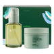 Endota Organics body care set featuring a Signature Blend Body & Massage Oil bottle and a Coffee and Sea Salt Body Polish jar, displayed in front of their green branded packaging box.