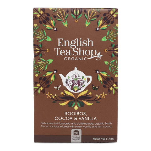 English Tea Shop organic tea package with decorative elements on a brown background