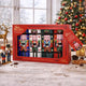 A boxed set of four Christmas nutcracker-shaped bottles from English Tea Shop, displayed in a red gift box.