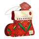 A festive red and green 'Sip of the Season' tea box set by English Tea Shop, featuring a hanging gold string and a cream-colored paper insert card.