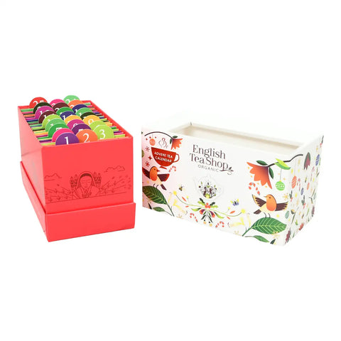 A boxed tea gift set on a white background, showing a red box filled with colorful numbered tea tabs.