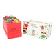 A boxed tea gift set on a white background, showing a red box filled with colorful numbered tea tabs.