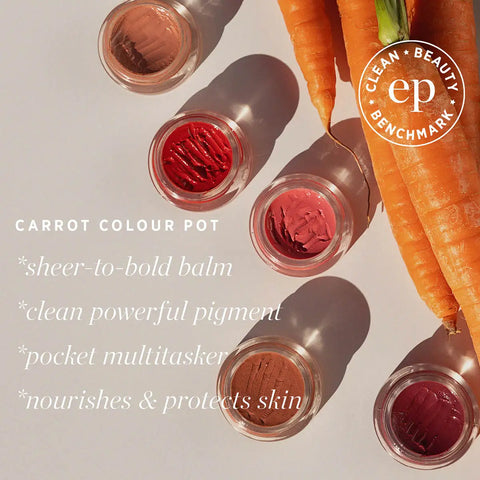 Carrot-coloured cosmetic pots with a 'Clean Beauty Benchmark' logo and text about product features.
