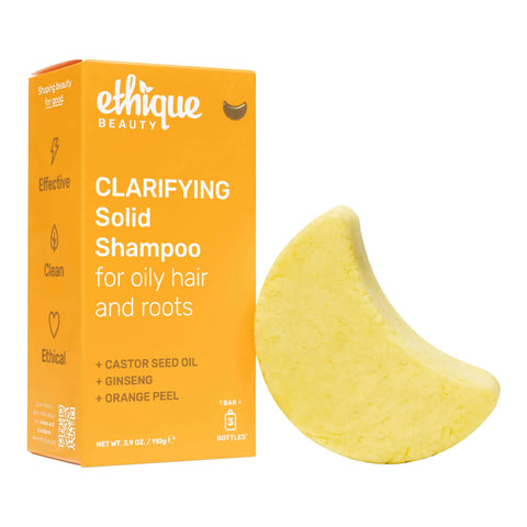Ethique Clarifying Solid Shampoo for Oily Hair and Roots 110g box next to yellow bar.