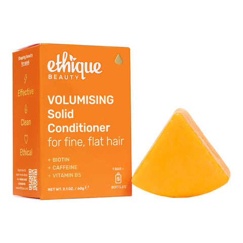 Ethique Volumising Solid Conditioner for Fine, Flat Hair 60g box next to orange bar.