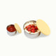 Buttercup yellow silicone lids and stainless steel snack pods. Small size filled with sauce. Bigger size filled with yoghurt, strawberries & granola.