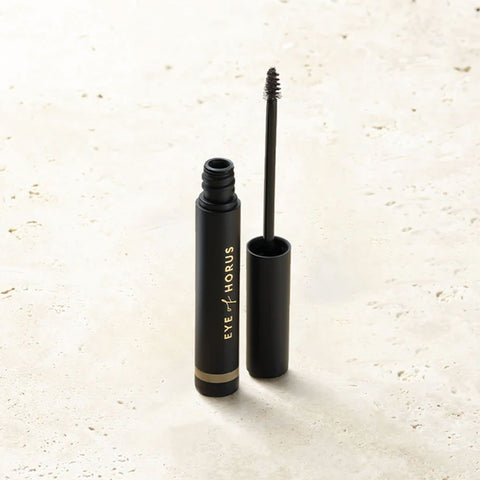 Eye of Horus Brow Fibre Extend Dynasty on a stone surface.