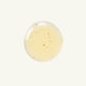 Close up of a drop of eye of horus serum on a white background.