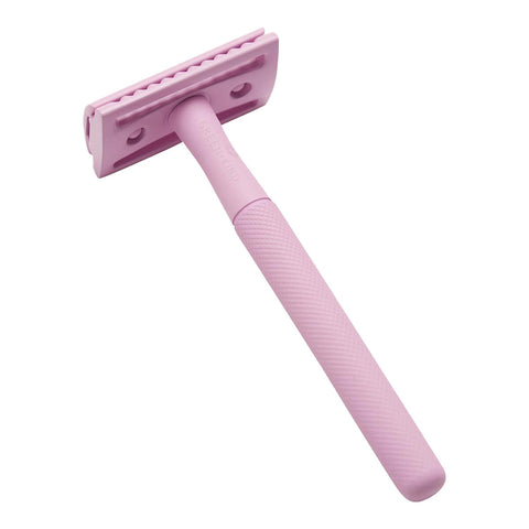 Stainless steel safety razor with a pastel purple finish.