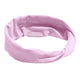 Kooshoo Organic Twist Headband - Pink Mist on a white background.