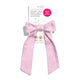 Kooshoo Plastic-Free Satin Bow Scrunchie - Violet Ice. Baby pink colour. With packaging against a white background.