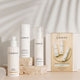 LAMAV skincare products on a neutral background, with stone slabs and packaging in frame.