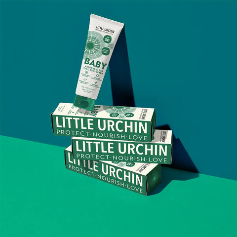 Little Urchin baby products on a teal background.