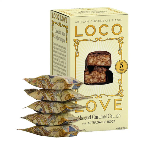 A box of Loco Love Artisan Chocolate Magic almond caramel crunch with astragalus root, shown with five individually wrapped candy packets stacked in front on a white background.