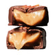 Classic chewy caramel chocolate cut in half and stacked with gooey caramel.
