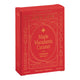 Red packaging of Maple Macadamia Caramel chocolate with gold text on a white background.