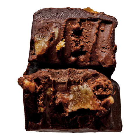 Stacked pieces of truffle showing a gooey decadent centre. 