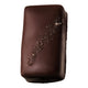 A single chocolate-covered rectangular pastry or candy bar with a glossy dark brown finish and a diagonal sprinkle of coarse chocolate flakes, isolated on a white background.