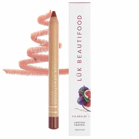A neutral mauve rose lipstick crayon, placed on a swatch of its color and texture, next to its packaging.