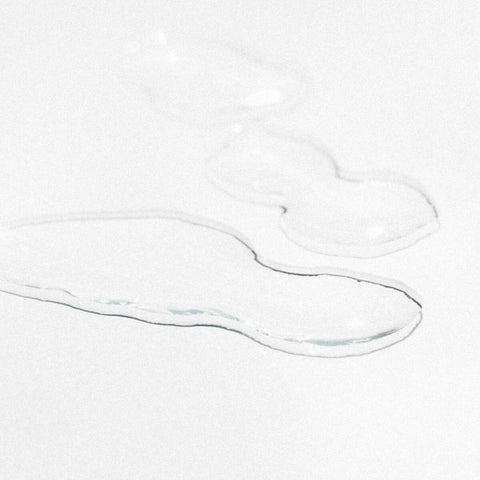 Liquid puddles on a white background.