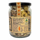 A glass jar of Minigift Foods Almond Husk, showing the back of the label with ingredients, nutrition facts, and a barcode, topped with a black lid decorated with three orange hearts.