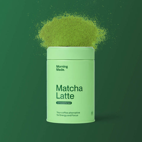 Green container of 'Matcha Latte' powder with 'Morning Made' branding on a green background