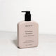 Mukti Botanique Shampoo bottle on a light gray background