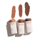 Swatches of bronzer in 3 earthy tones on a white background.