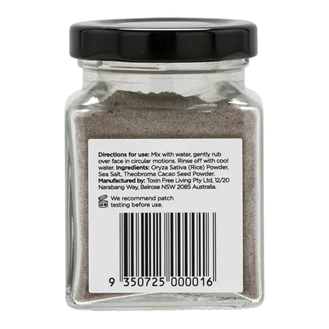 Glass jar with black lid containing a brown powder, labeled with directions and ingredients.