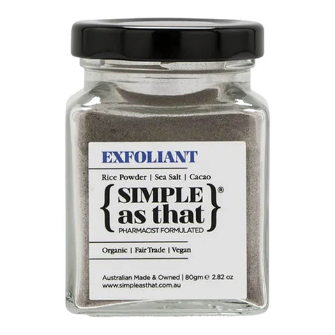 Glass jar of exfoliant with 'Simple as That' label on a white background