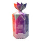 A tall, hexagonal gift box with a colorful geometric pattern in purple, pink, orange, and white, tied at the top with a matching paper bow.