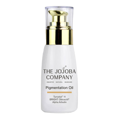 The Jojoba Company Pigmentation Oil - 30ml bottle with a pump top. White bottle with gold lid on a white background. 