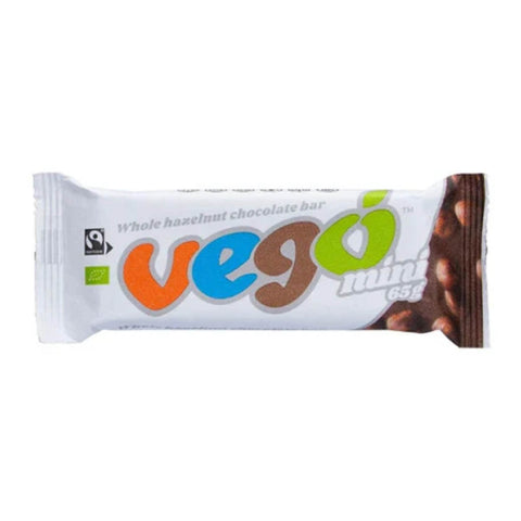 Vegó Mini whole hazelnut chocolate bar in its white wrapper, featuring the colourful Vegó logo and a photo of chocolate-covered hazelnuts on the right side.