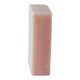 Rectangular pinkish bar of rose geranium soap on a white background