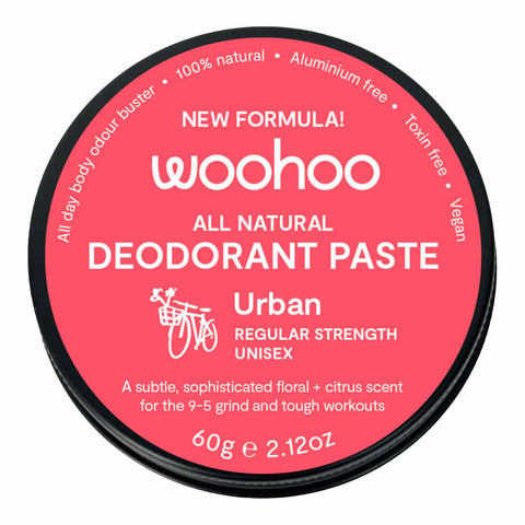Woohoo all-natural deodorant paste container with pink label on a white background. Urban - a subtle sophisticated floral + citrus scent.