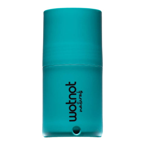 Teal container with 'wotnot naturals' branding on a white background. Roll-on applicator for sunscreen, refillable & eco-friendly.