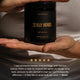 Person holding jar of Zeally Herbs Intestinal Parasite Cleanse with a five-star rating and customer review.